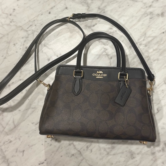 Coach Handbags - Coach Brown and Black Satchel with Gold Accents